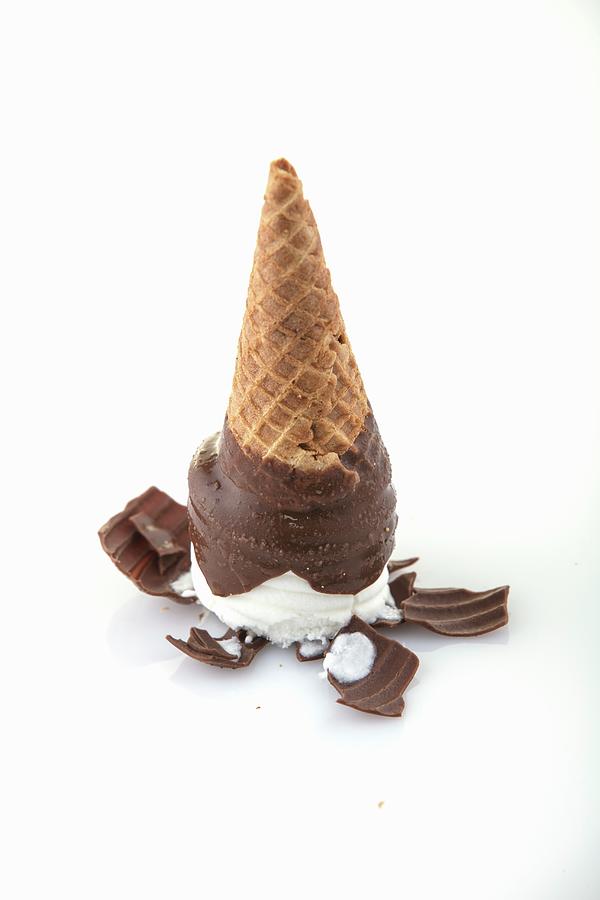 A Chocolate-covered Ice Cream Cone Tipped Upside Down Photograph by Cindy Haigwood