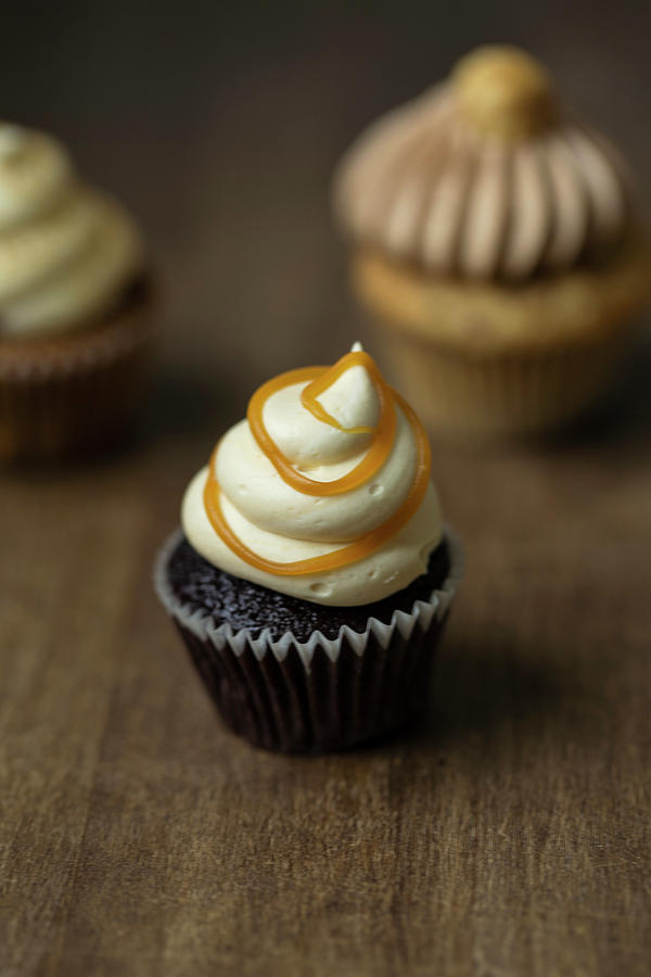 A Chocolate Cupcake With Caramel Photograph by Nicole Godt