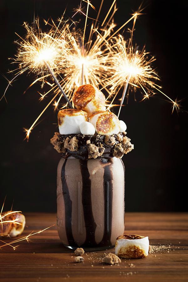 A Chocolate Freak Shake With Marshmallows And Sparklers Photograph by Eising Studio