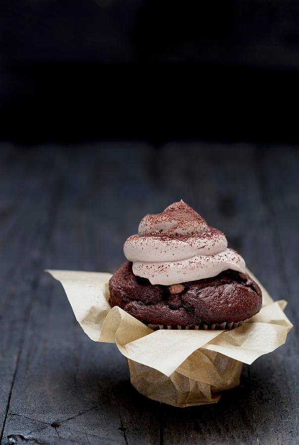 A Chocolate Muffin With Cocoa Cream Photograph by Nils Melzer