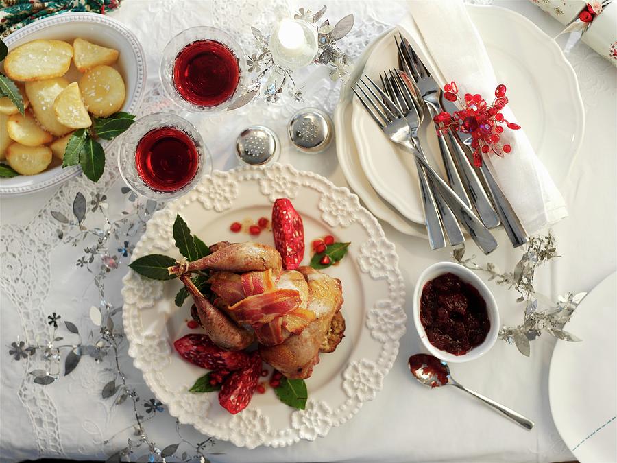 A Christmas Dish: Roasted Pheasant With Bacon, Pomegranate And Potatoes Photograph by Ian Garlick
