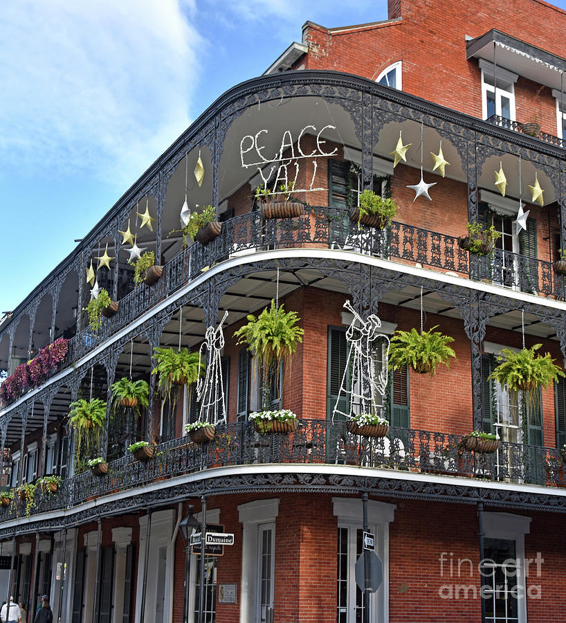 New Orleans Photograph -  A Christmas Greeting, Peace Yall,  On A French Quarter Building IN New Orleans by Tom Wurl