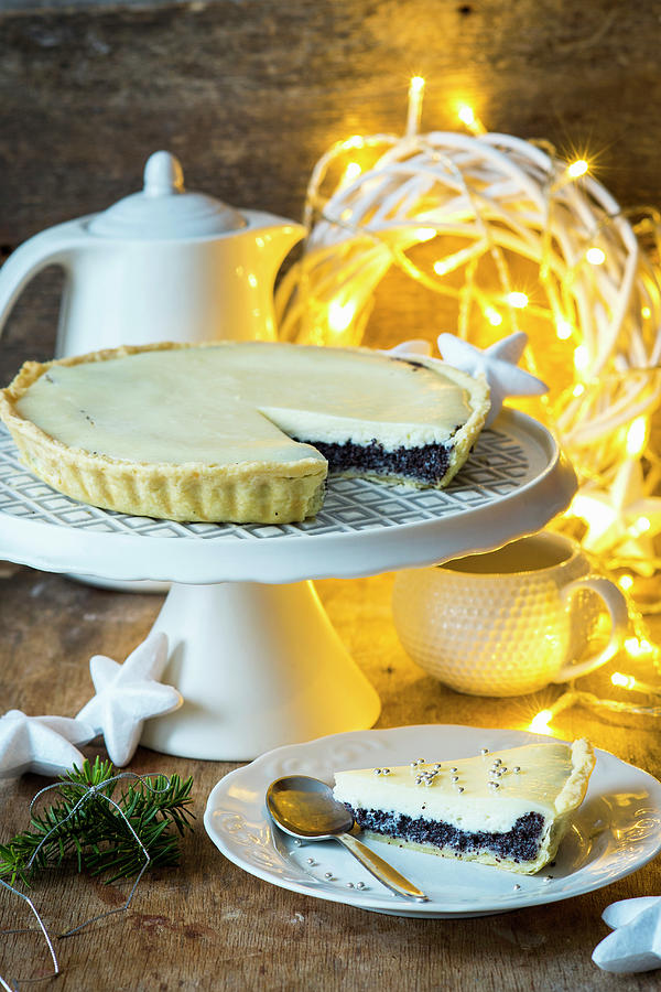 A Christmas Poppy Seed Tart With A Slice Cut Out Photograph by Irina Meliukh