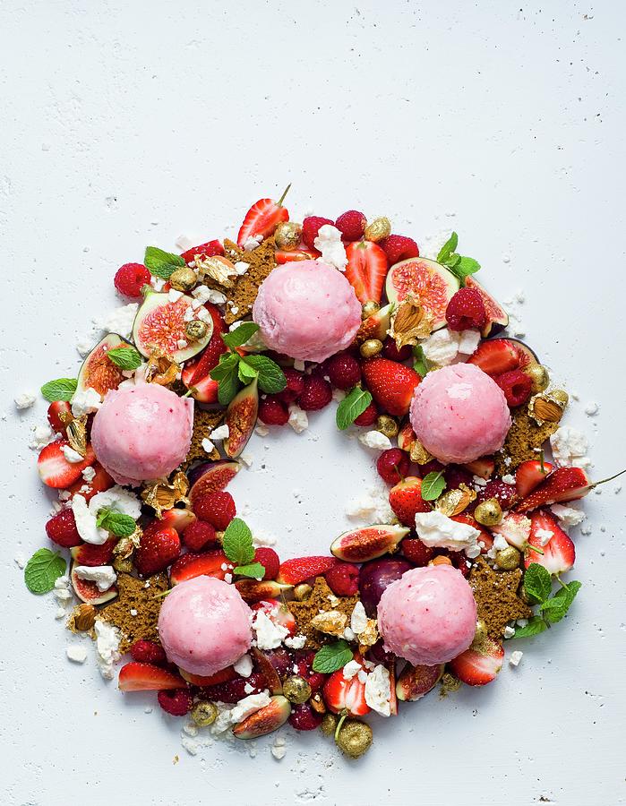 A Christmas Wreath Dessert With Gingerbread Stars, Fruit And Ice Cream Photograph by Great Stock!
