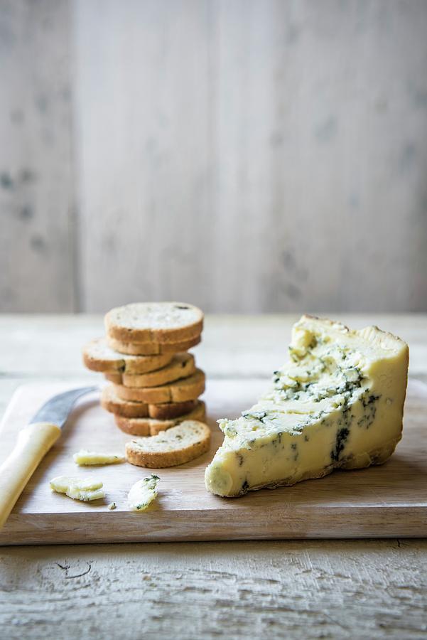 A Chunk Of Blue Cheese With Bread Crackers Photograph by Magdalena Hendey