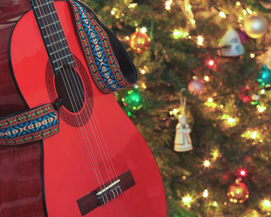 Music Photograph - A Classical Guitar Beside a Christmas Tree by Derrick Neill