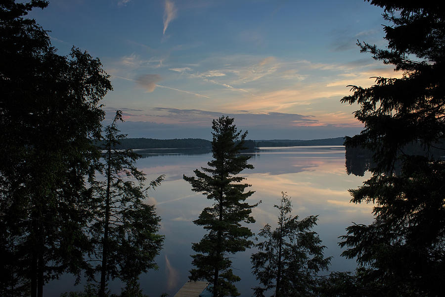 A cloudy reflection- Wollaston Lake - Ontario, Canada Photograph by ...