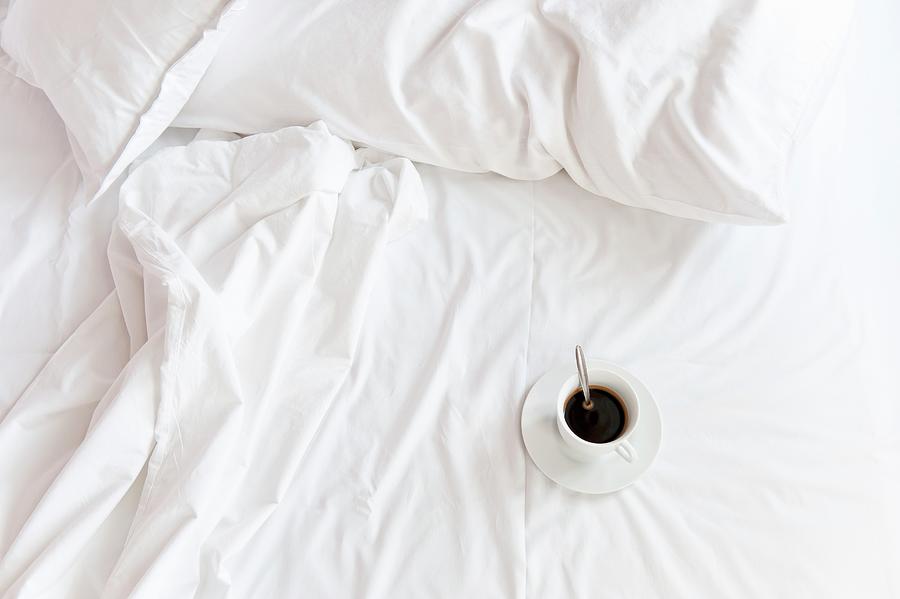 A Coffee Cup In The Bed Photograph by Veronika Studer