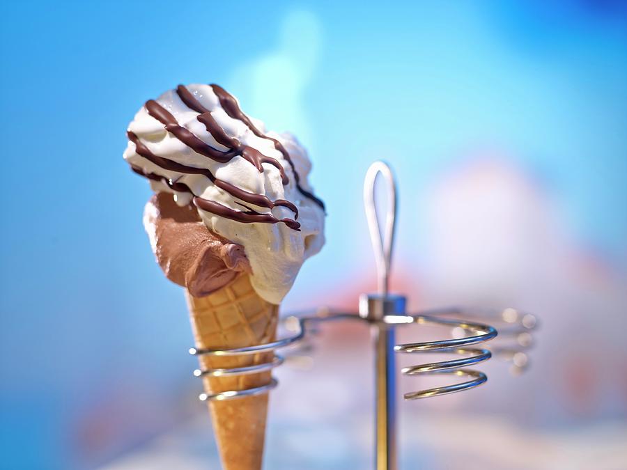 A Cone Of Soft-serve Ice Cream In A Cone Holder Photograph by Jalag / Michael Holz
