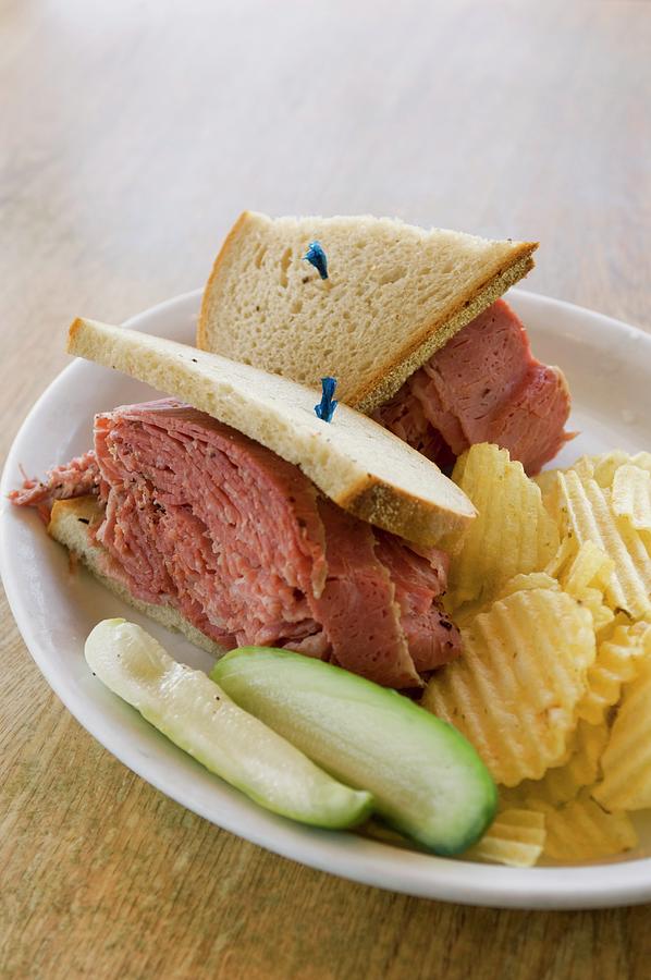 A Corned Beef Sandwich With Crisps And Pickled Gherkins Photograph by Rank, Erik
