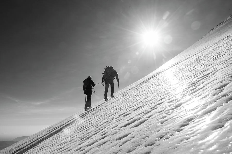 A Couple Climbing The Glacier Of Pico De Orizaba In Mexico Photograph by Cavan Images