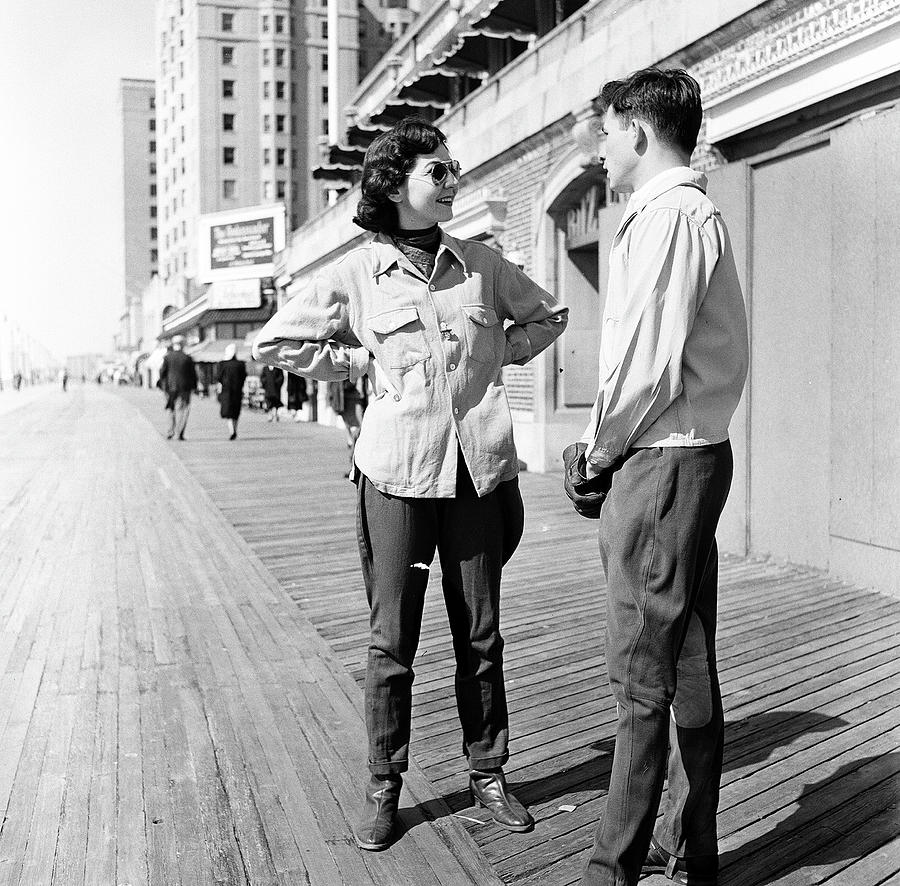 A Couple On The Boardwalk Photograph by Rae Russel