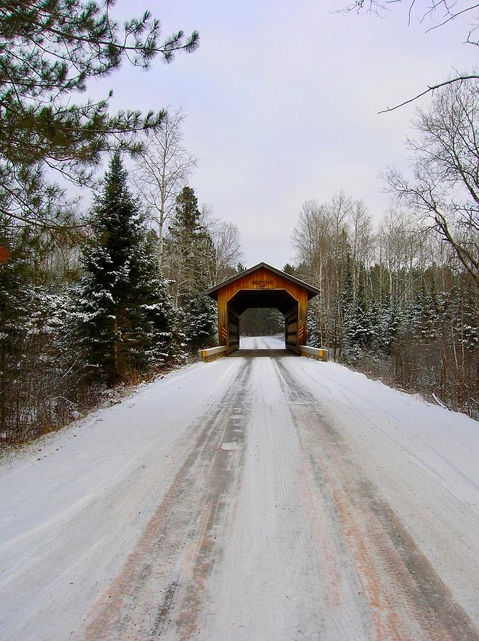 A Covered Bridge in Snow Photograph by Dennis Schmidt