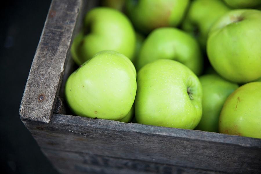 A Crate Of Granny Smith Apples At A Market In East London Photograph by George Blomfield