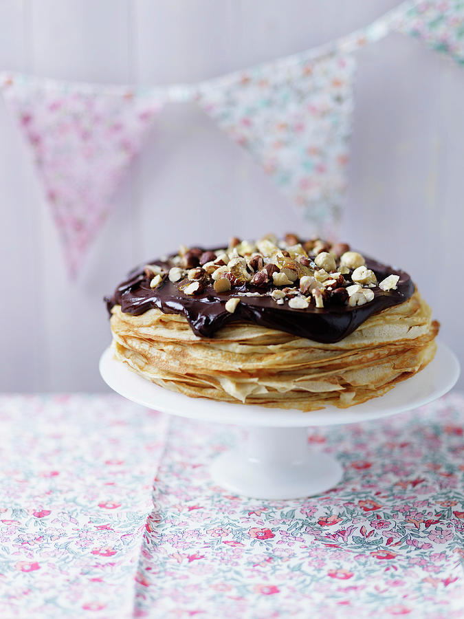 A Crepe Cake Topped With Chocolate And Hazelnuts Photograph by Karen Thomas