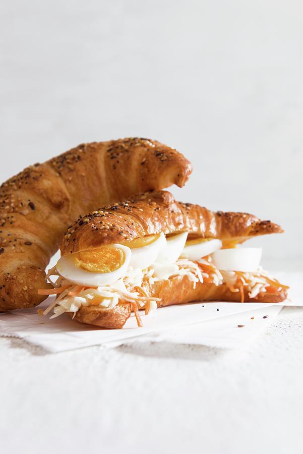 A Croissant Filled With Hard-boiled Eggs And Coleslaw Photograph by Veronika Studer