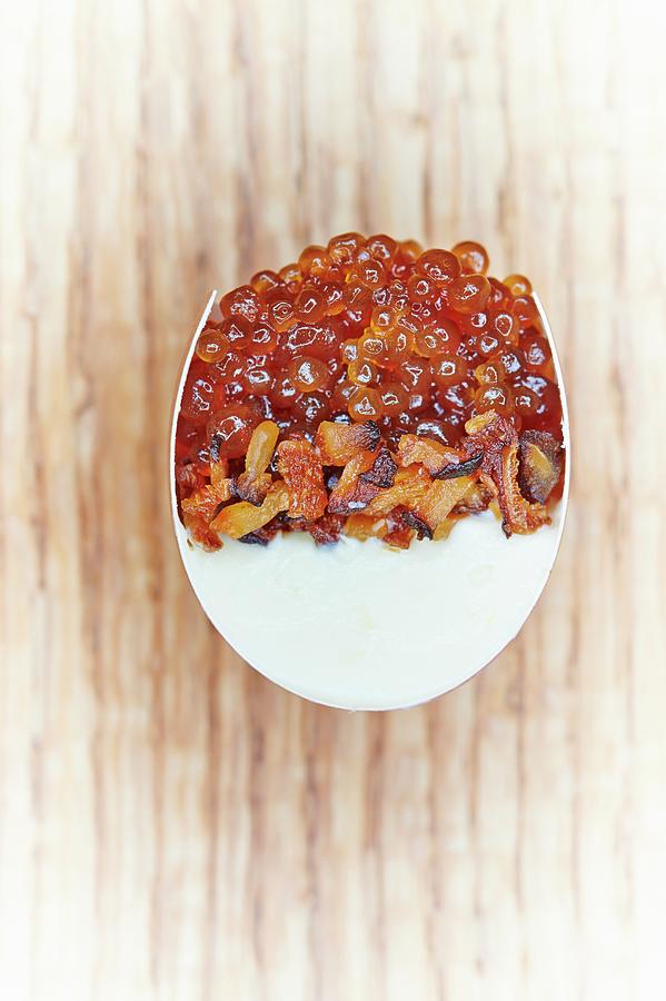 A Cross-section Of A Devilled Egg Filled With Lemon Cream, Fried Shiitake Mushrooms, Bonito Caviar And Maple Syrup Photograph by Greg Rannells