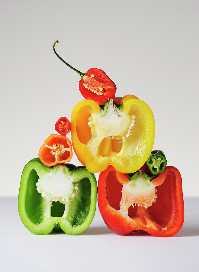 A Cross-section Of Peppers Photograph by David Malan