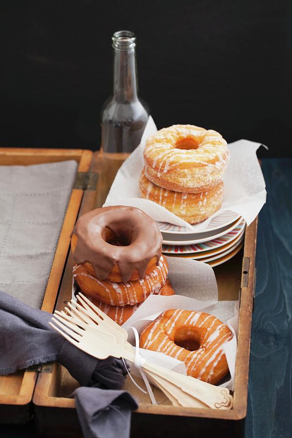 A Crossover Between Doughnuts And Croissants, In A Wooden Crate Photograph by Elisabeth Clfen