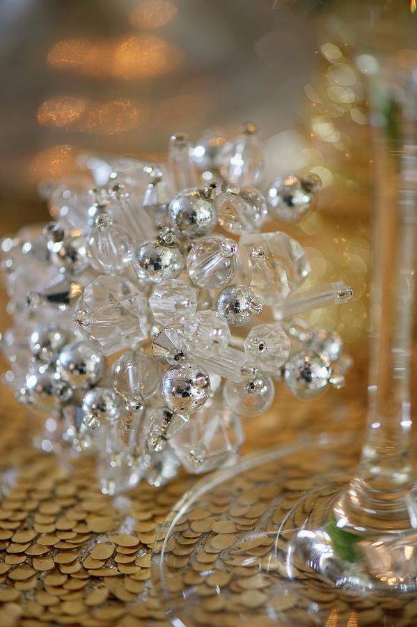 A Crystal Christmas Decoration On A Table Photograph by Heinze, Winfried