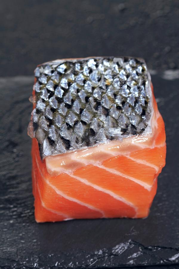 A Cube Of Fresh Salmon On A Slate Platter close-up Photograph by Miriam Rapado
