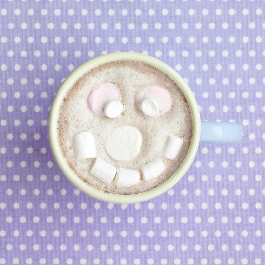 A Cup Of Cocoa With A Marshmallow Face Photograph by Ria Osborne
