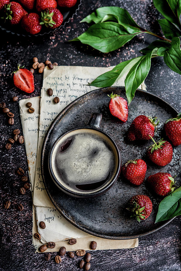 A Cup Of Coffee On A Serving Plate With Strawberries Photograph by Diana Kowalczyk