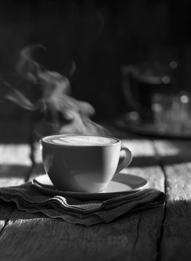 A Cup Of Steaming Cappuccino Photograph by Hugh Johnson