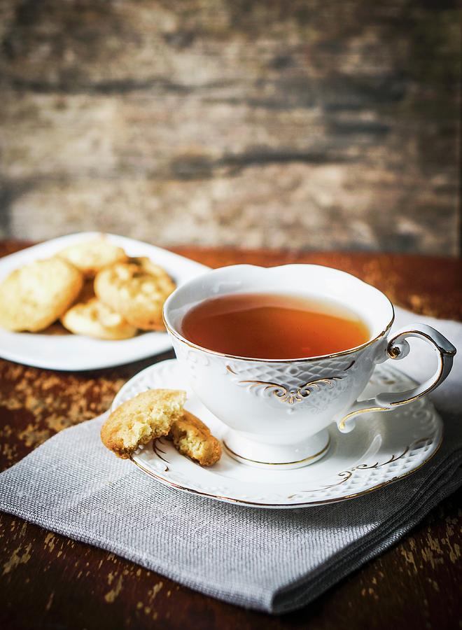 A Cup Of Tea And Biscuits Photograph by Alena Haurylik
