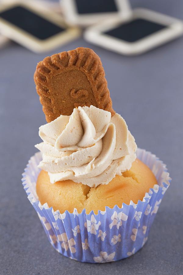 A Cupcake Decorated With A Caramelised Biscuit Photograph by Lydie Besancon