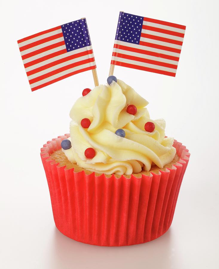 A Cupcake Decorated With Us Flags Photograph by Foodfolio