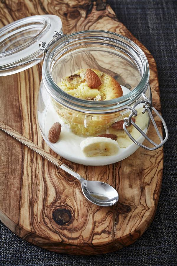 A Cupcake In A Jar With Banana And Almonds Photograph by Alexander Van Berge