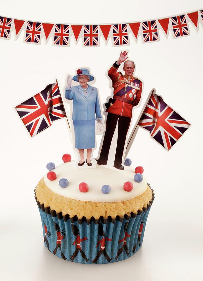 A Cupcake Topped With Queen Elizabeth II Of England And The Duke Of Edinburgh Photograph by Foodfolio