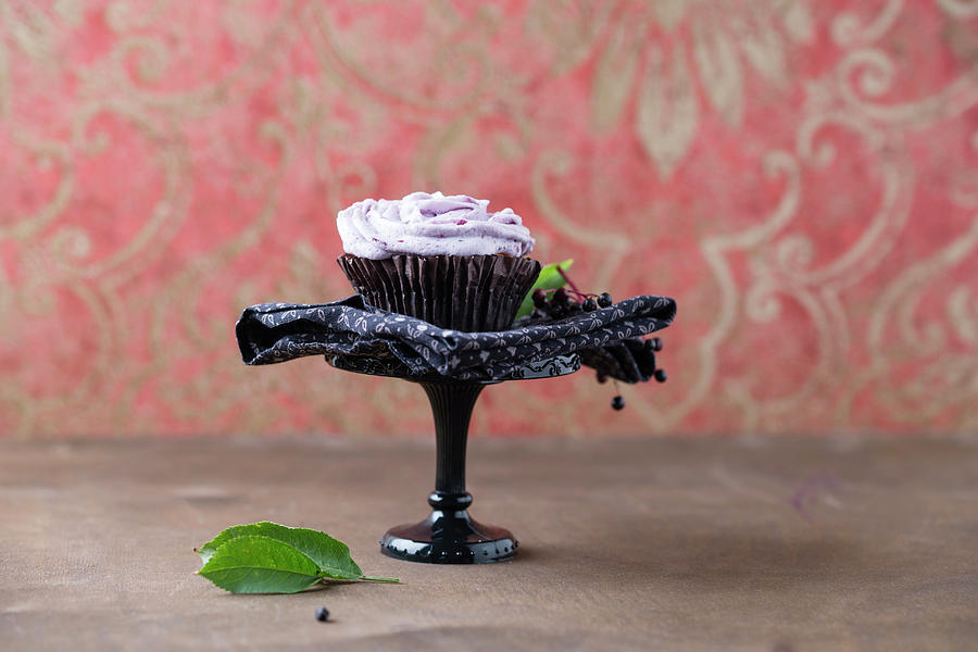 A Cupcake With Elderberry Frosting Photograph by Mandy Reschke