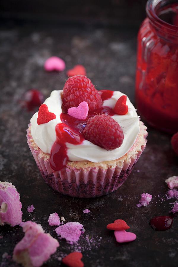 A Cupcake With Raspberries For Valentines Day Photograph by Eising Studio