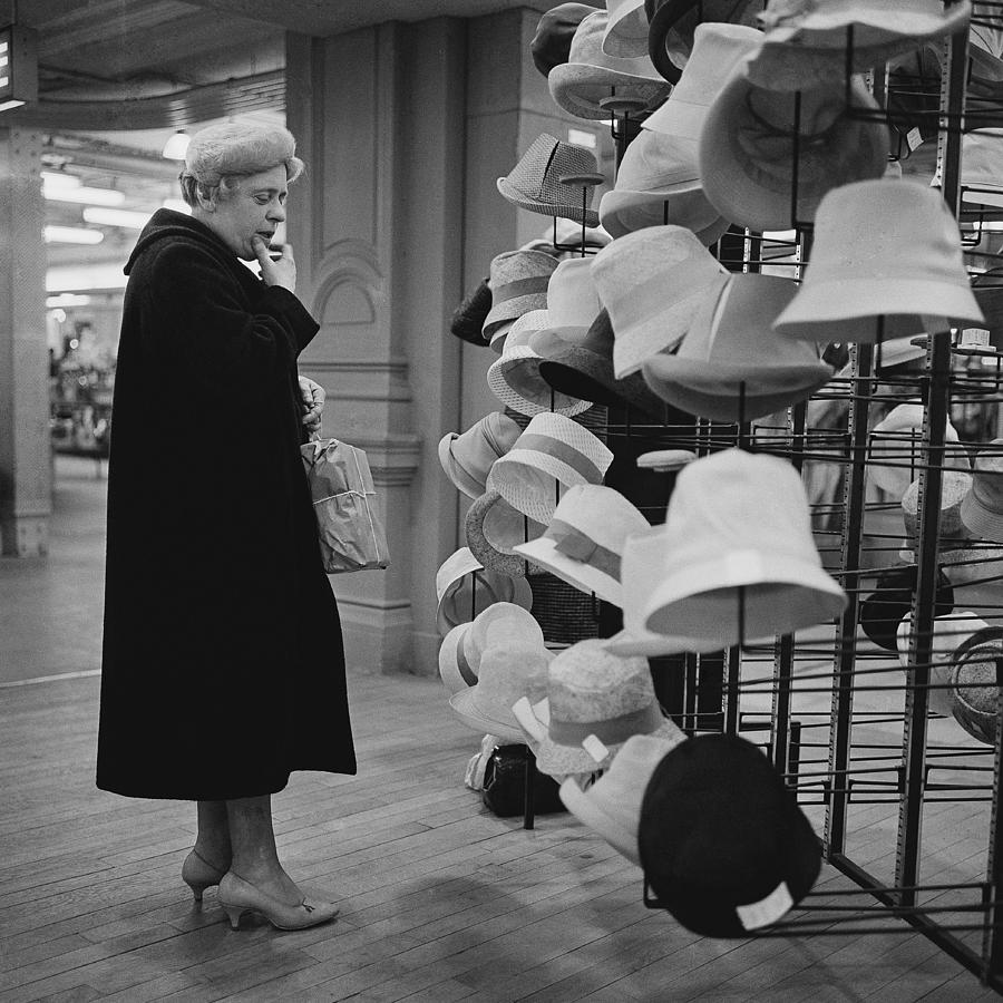 A Customer At Bhv Hat Department In 1961 Photograph by Keystone-france