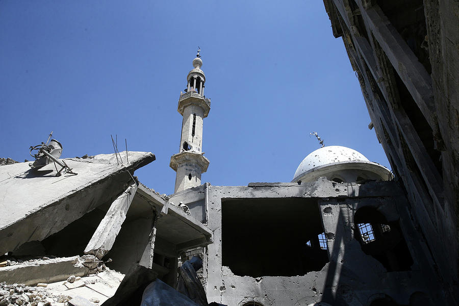 A Damaged Mosque is Seen in the Rebel Photograph by Bassam Khabieh ...