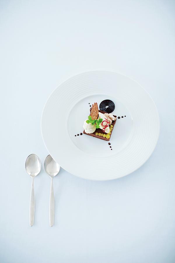 A Dessert Composition Featuring Caramel And Liquorice restaurant Frhsammer, Berlin, Germany Photograph by Jalag / Joerg Lehmann