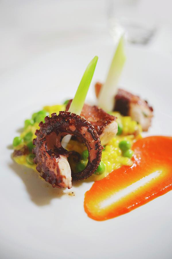 A Dish From The Goldenen Engel In Flonheim: Squid With A Pea, Raisin And Almond Risotto Photograph by Jalag / Maria Schiffer