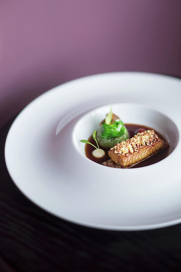 A Dish From The Restaurant Lafleur, Eel With Pork Belly, Frankfurt Am Main, Germany Photograph by Jalag / Markus Bassler