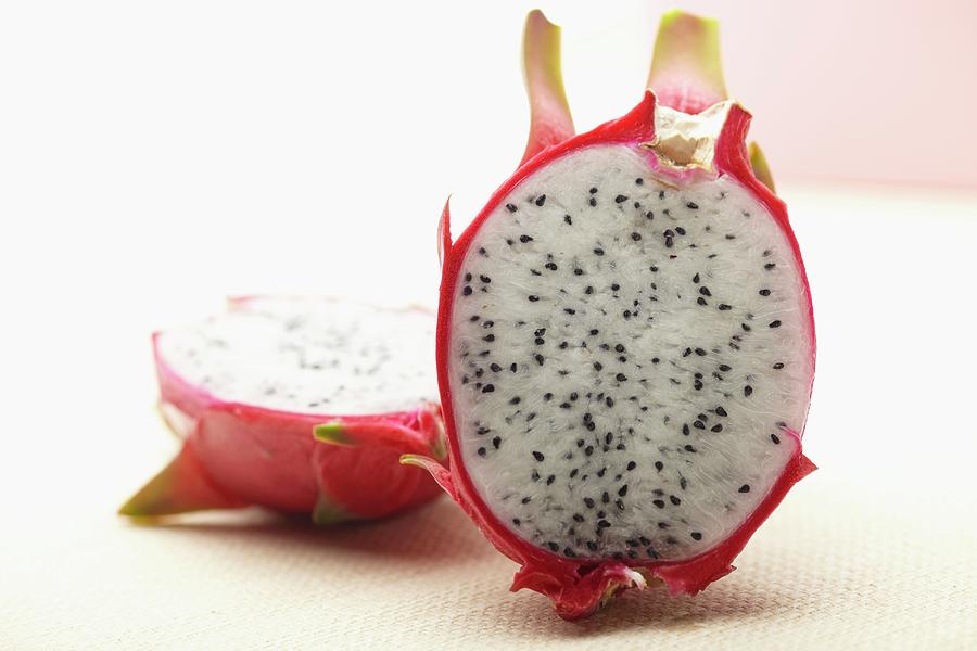 A Dragon Fruit Cut In Half Photograph by Bruce James