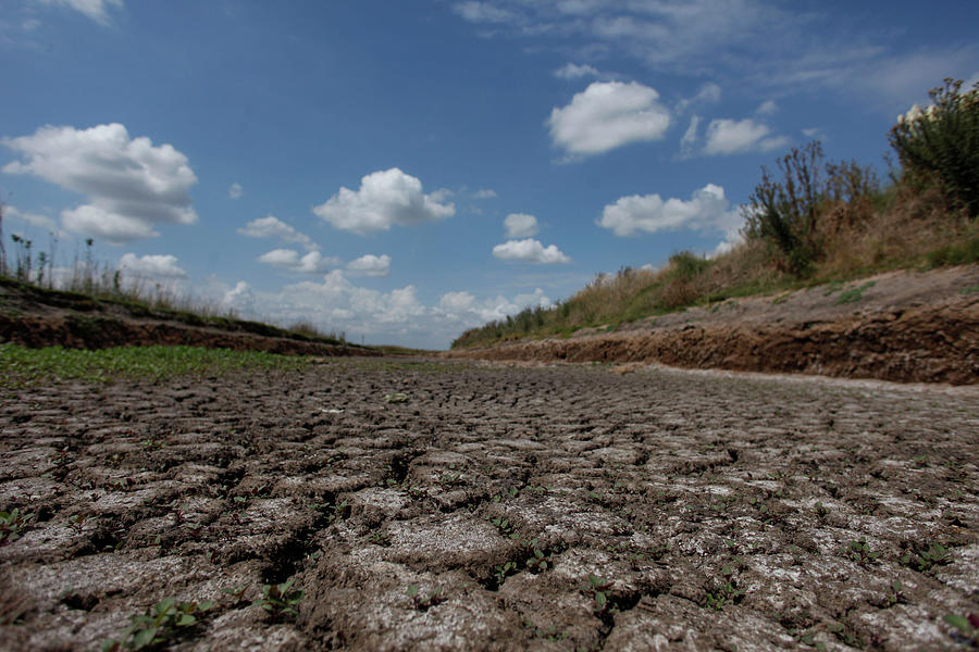 A Dried-up Creek Bed is Seen Photograph by Martin Acosta - Fine Art America