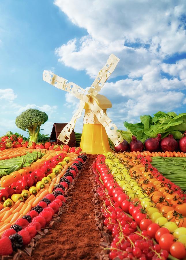 A Dutch Landscape Made From Fruit And Vegetables With A Cheese Windmill Photograph by Jan Prerovsky