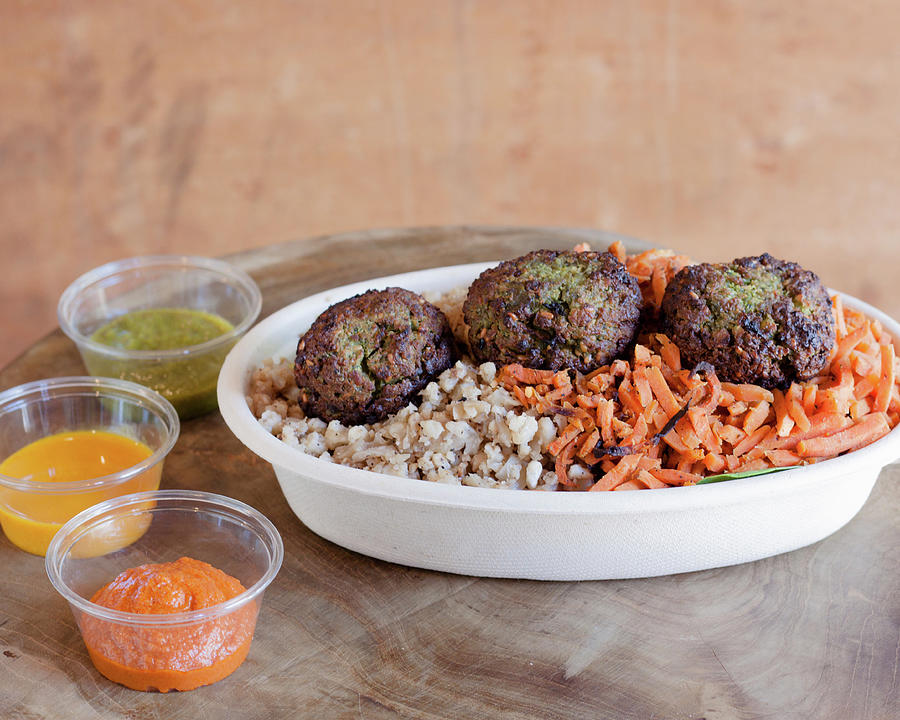 A Falafel Bowl With Vegetables And A Trio Of Dips Photograph by Pamela Eberhard Photography