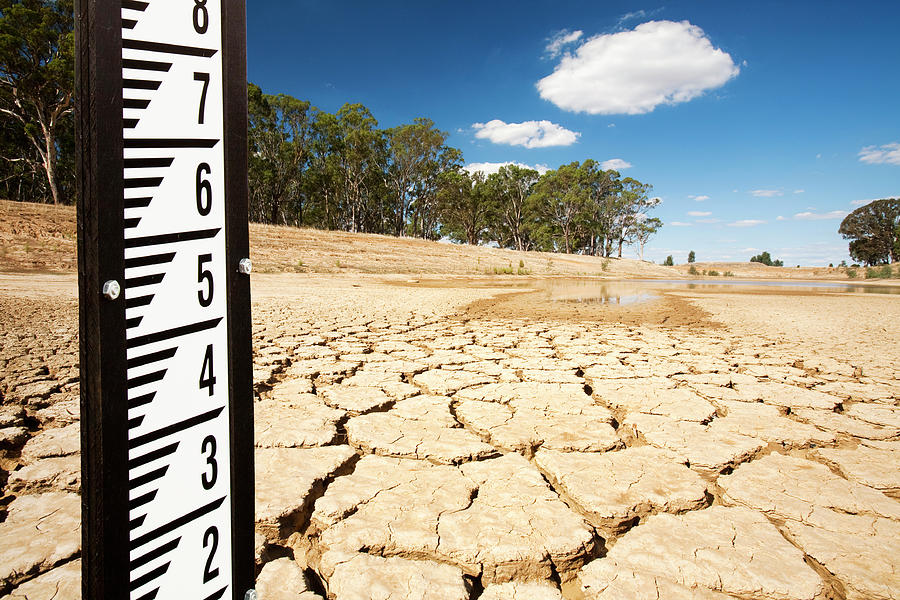 Farm Photograph - A Farmers Watering Hole On A Farm Near Shepperton, Victoria, Australia, Almost Dried Up. Victoria And New South Wales Have Been Gripped By The Worst Drought In Living Memory For The Last 15 Y by Cavan Images