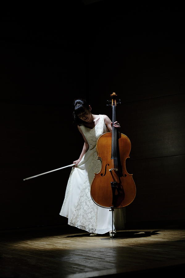 A Female Cellist Making A Bow On Stage Photograph by Sot