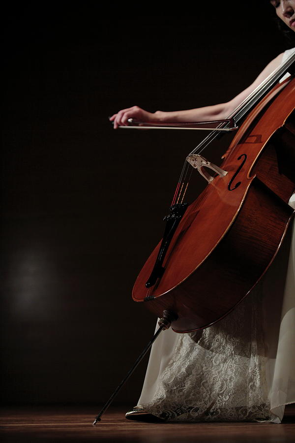 A Female Cellist Playing Cello On Photograph by Sot
