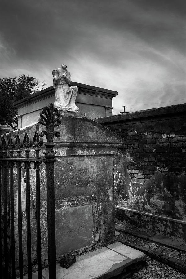 A Fence A Wall and A Headless Angel In Black and White Photograph by Greg and Chrystal Mimbs