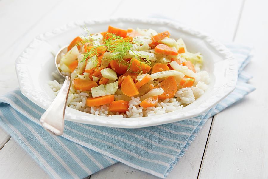 A Fennel And Carrot Medley On A Bed Of Rice Photograph by Claudia Timmann