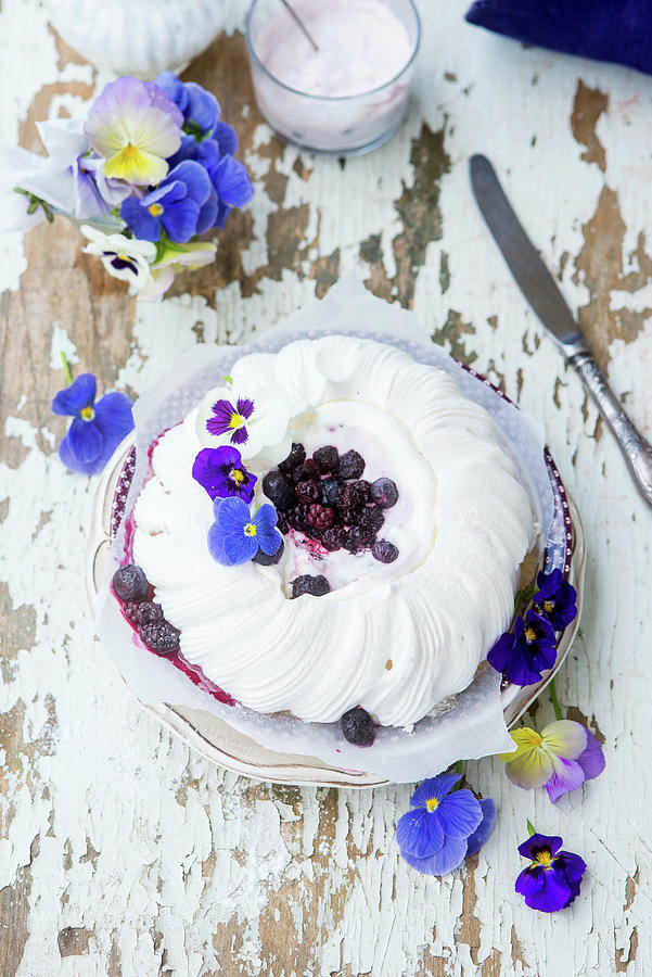A Festive Pavlova With Berries And Pansies Photograph by Irina Meliukh